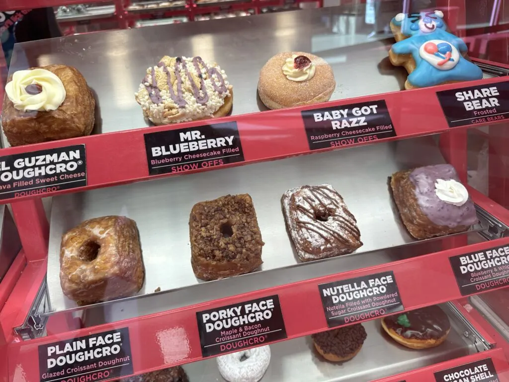 Close up of about 10 other pastries  in the display case. 