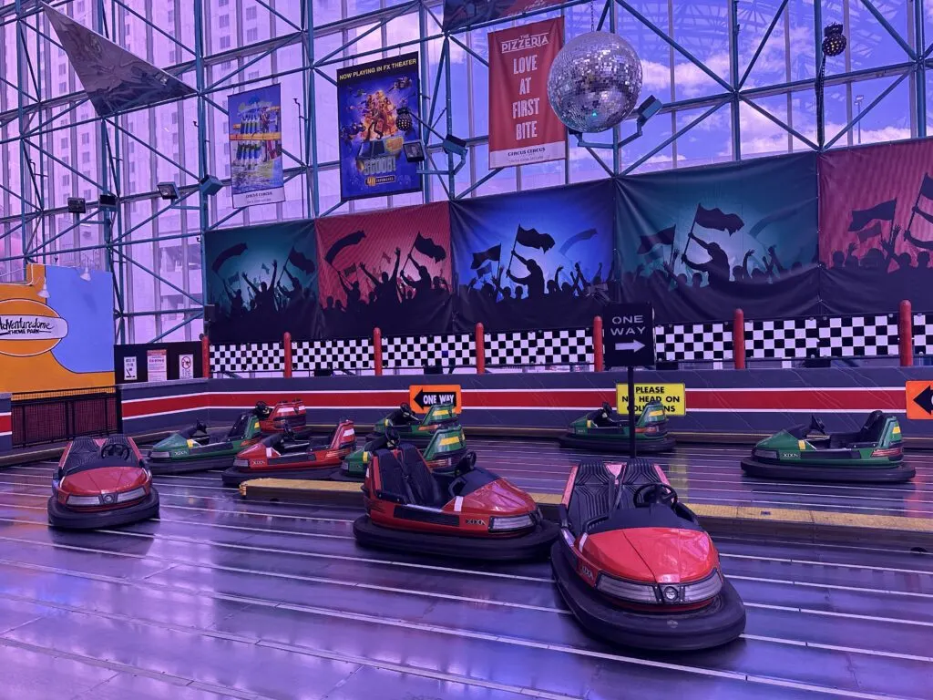 Bumper cars sitting empty waiting for the next round of riders. 