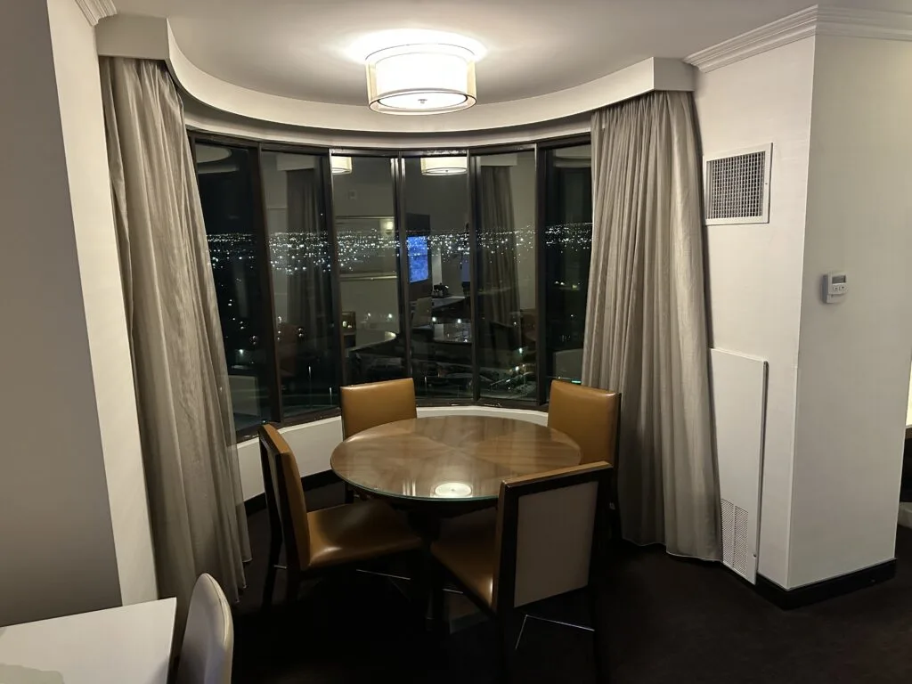 Dining Area with windows overlooking Vegas. 