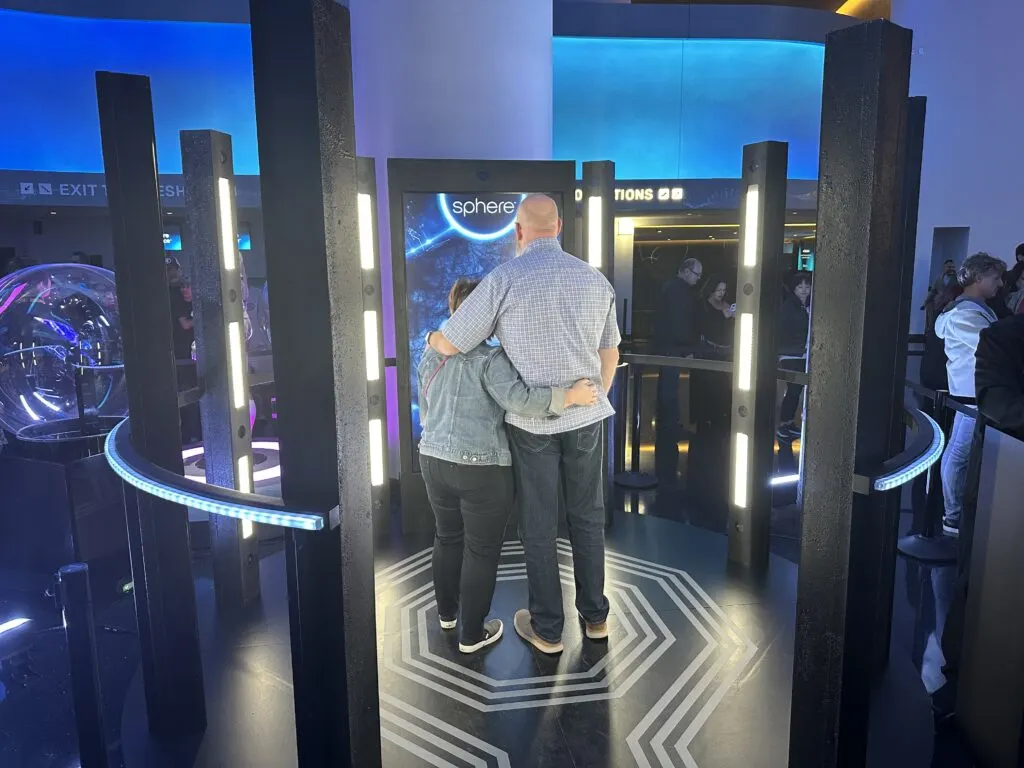 Two guests pose in The Sphere's Avatar Generator. 