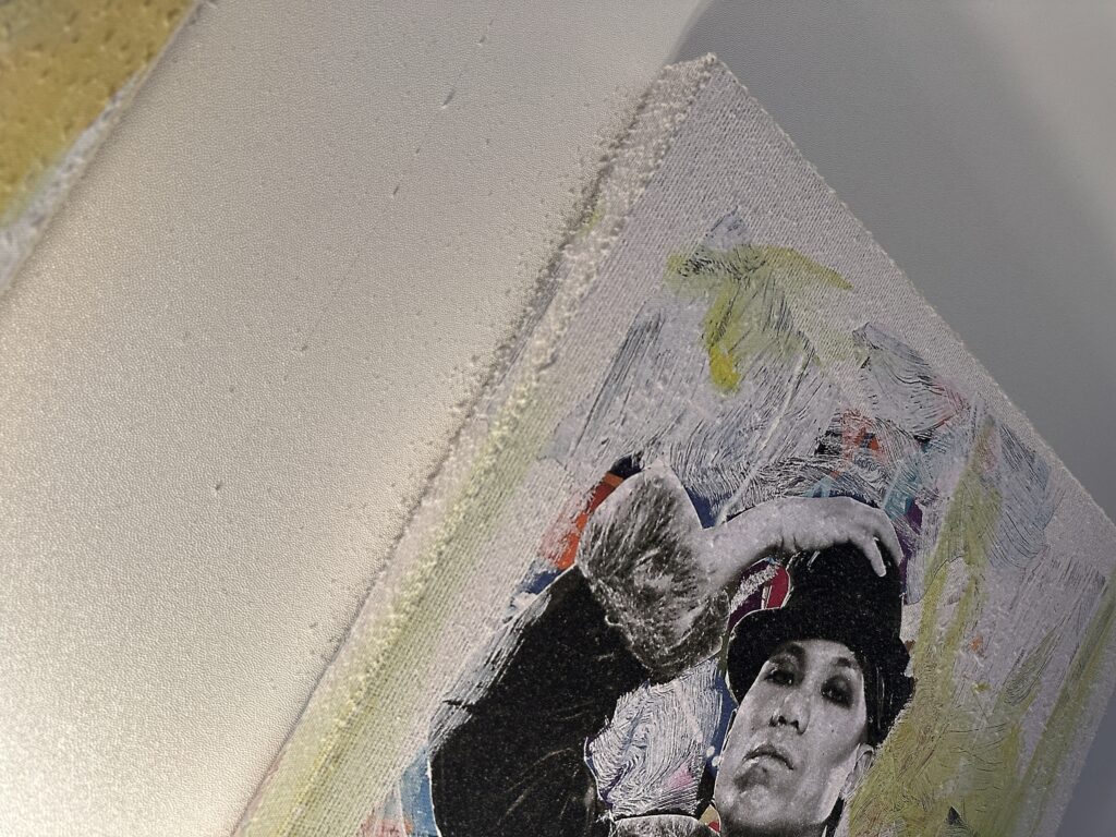 Dust accumulation on the wall art above the beds. 