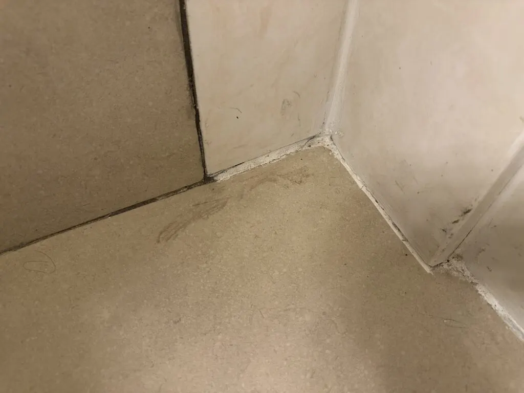A dirty corner in the bathroom. 