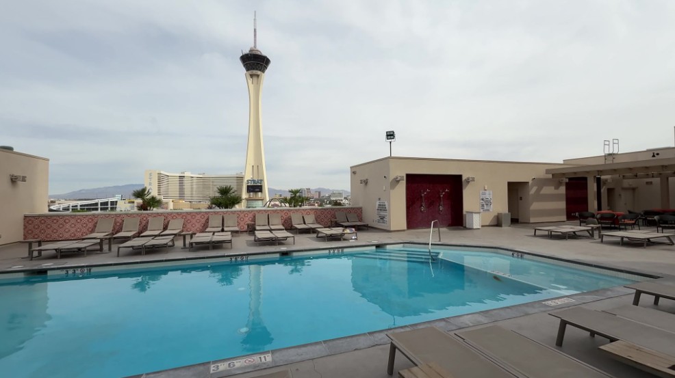The Alexandria pool in the foreground, and STRAT's tower visible in the distance.
