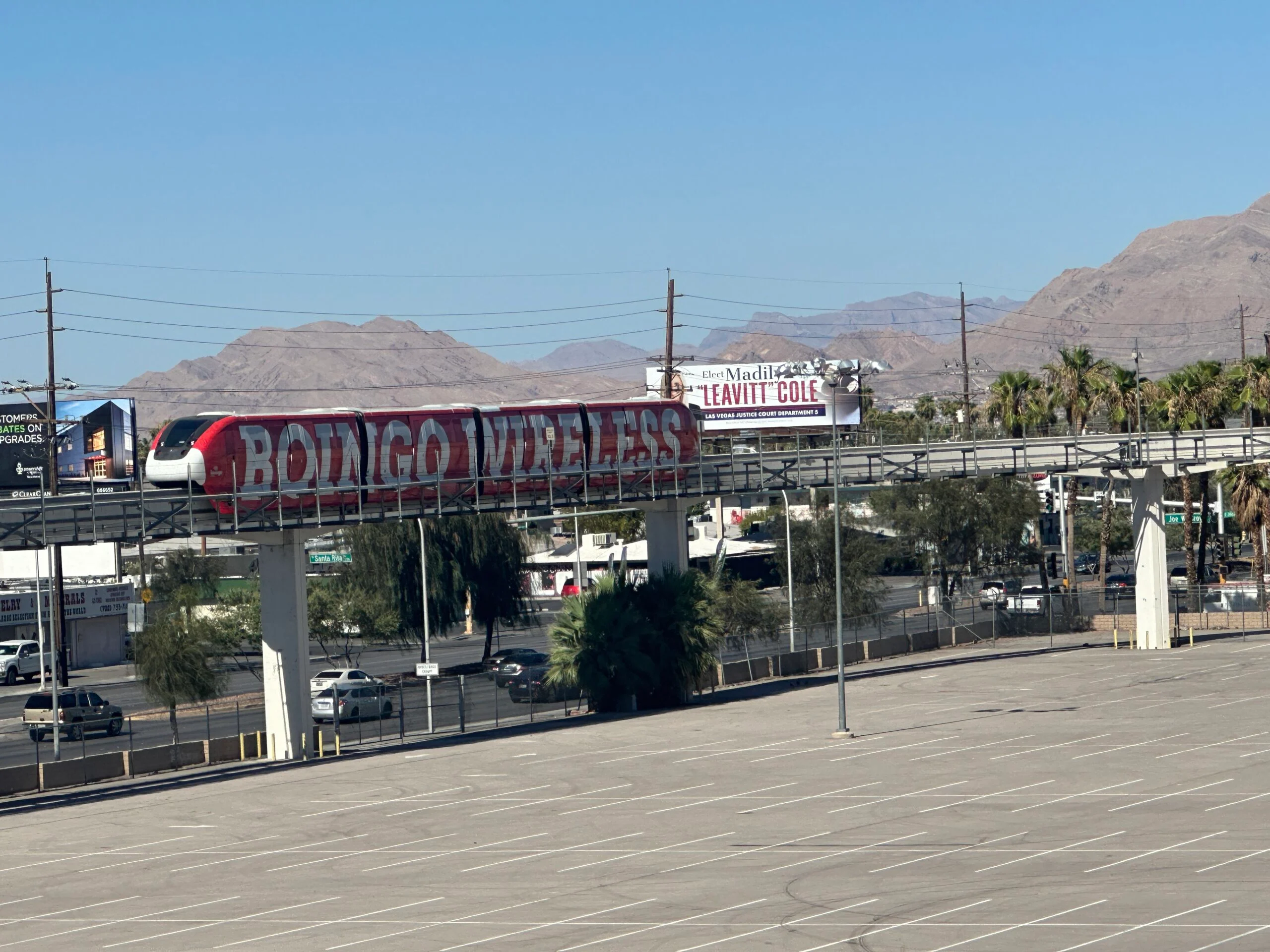 A Las Vegas Monorail tram on the elevated track coming into the station.
