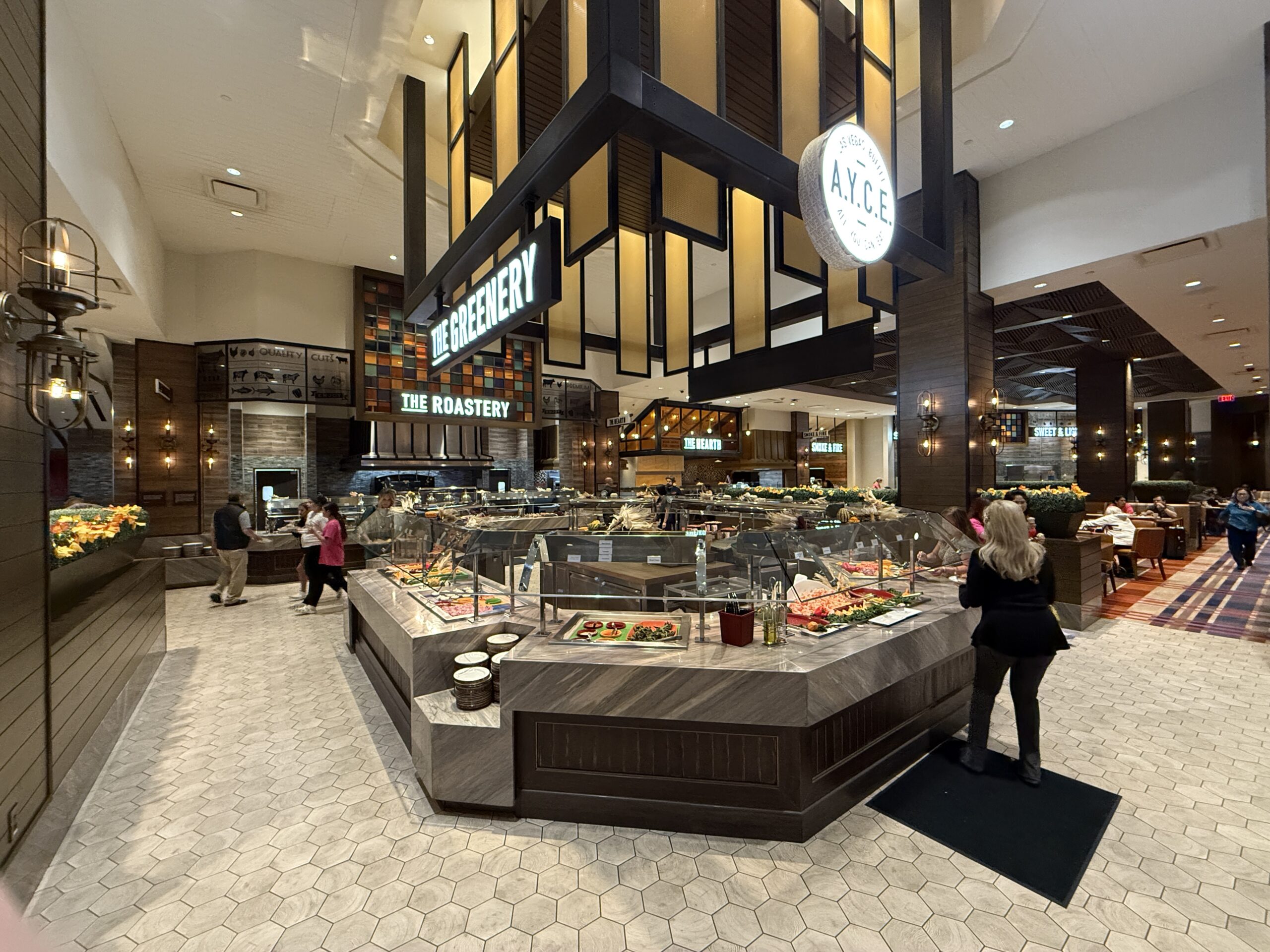 A center island stocked with food at the buffet.