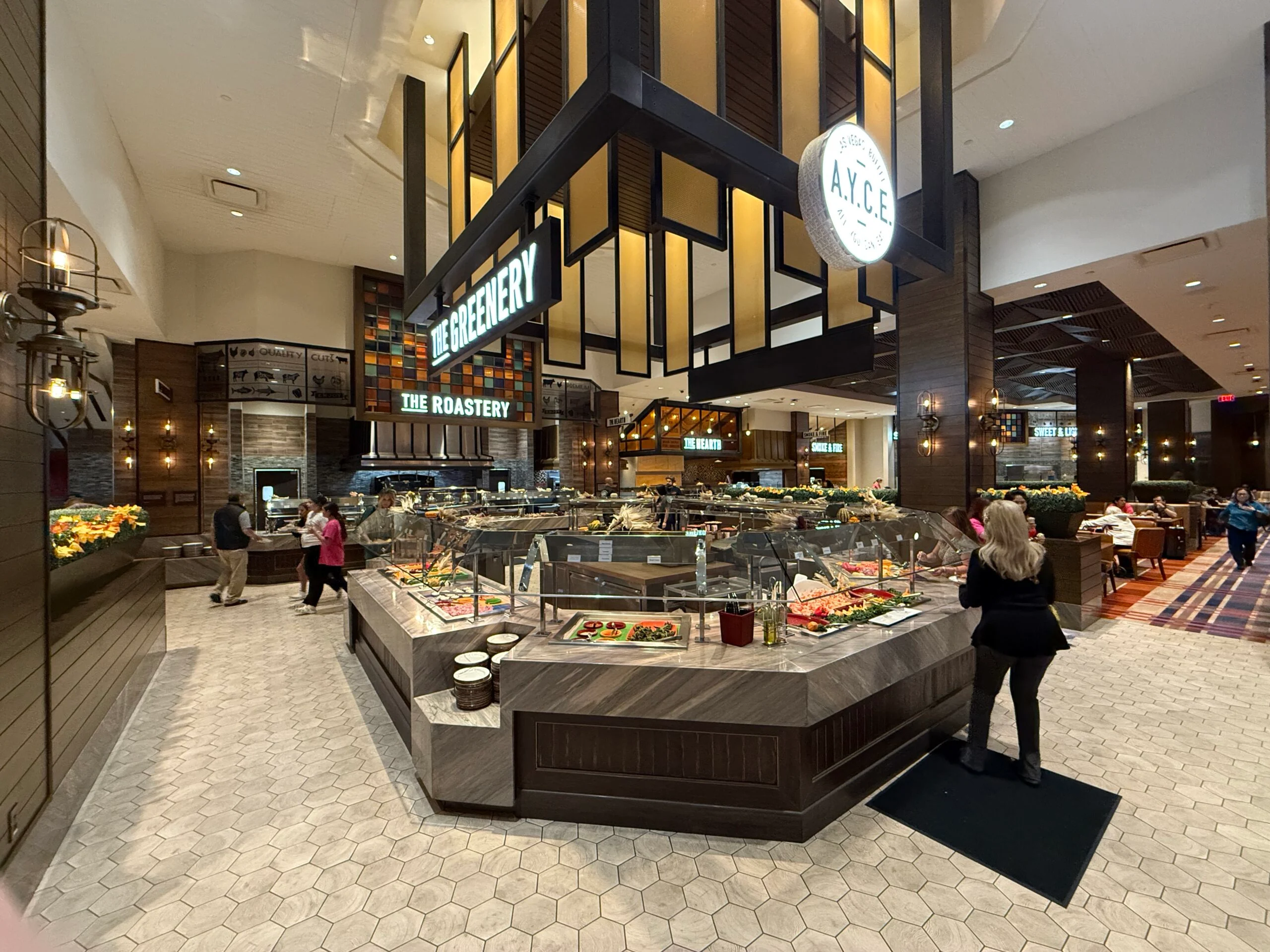 A center island stocked with food at the buffet.