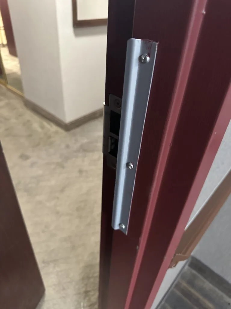A break in guard on the hotel room door.