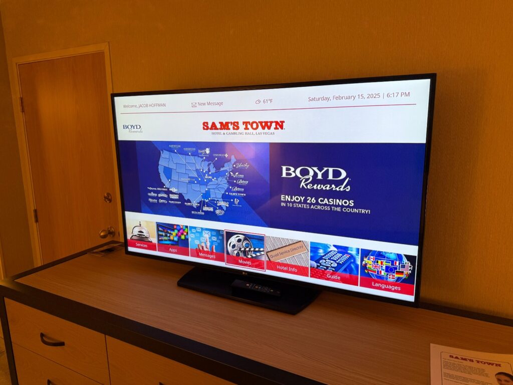 The 55 inch TV on the TV stand. 