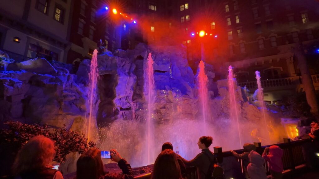 4 Columns of water shoot into the air as part of the Mystic Falls Park light show. 