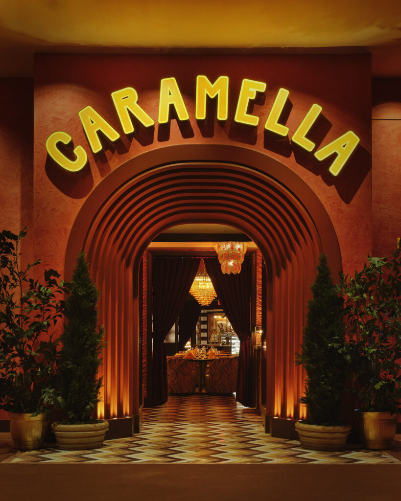 Entrance to Caramella, which is an arched doorway with "Caramella" lettering above it. 