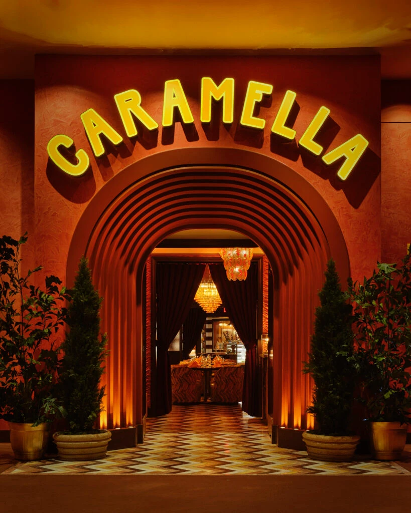 Entrance to Caramella, which is an arched doorway with "Caramella" lettering above it. 