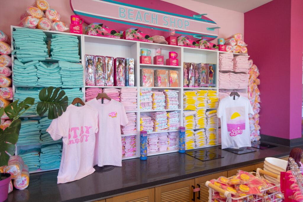 A shelf stocked with Barbie apparel in the gift shop.