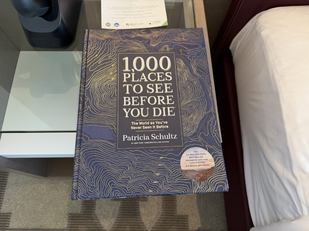 A book titled 1000 places to see before you die.