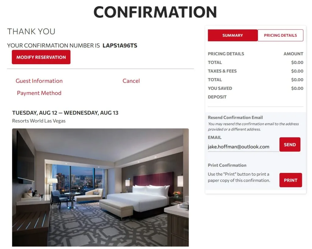 A booking confirmation that shows $0 room cost. 