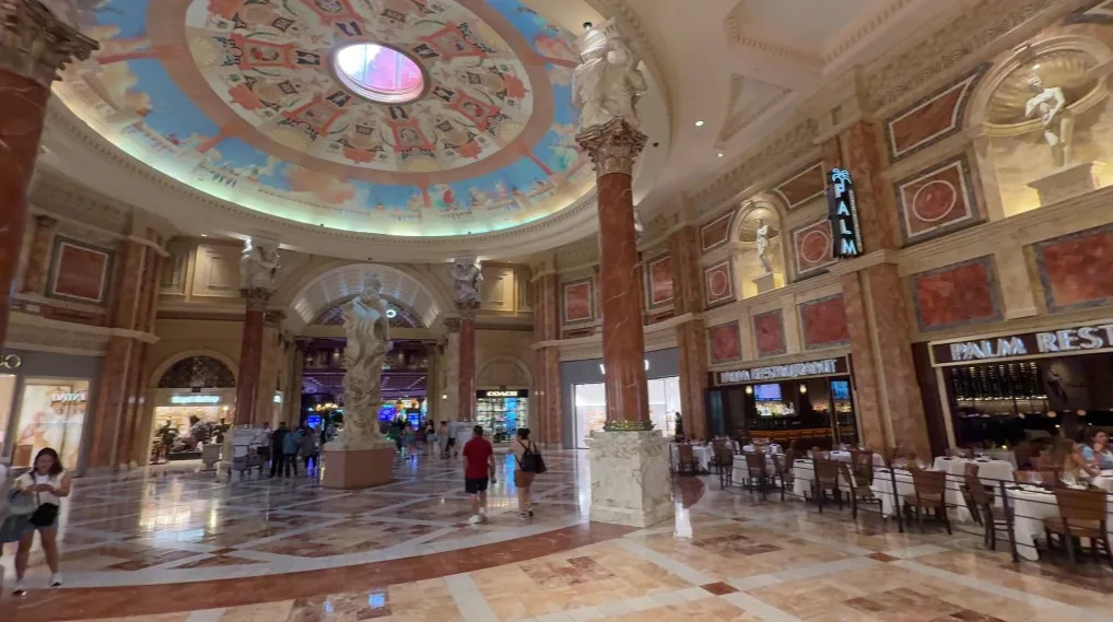 A natural skylight in a giant atrium within the Forum Shops. To the right is the Palm restaurant.