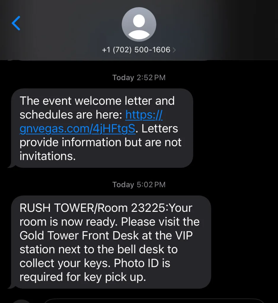Screenshot of a text message notification letting me know that I can head to the front desk to check in. 