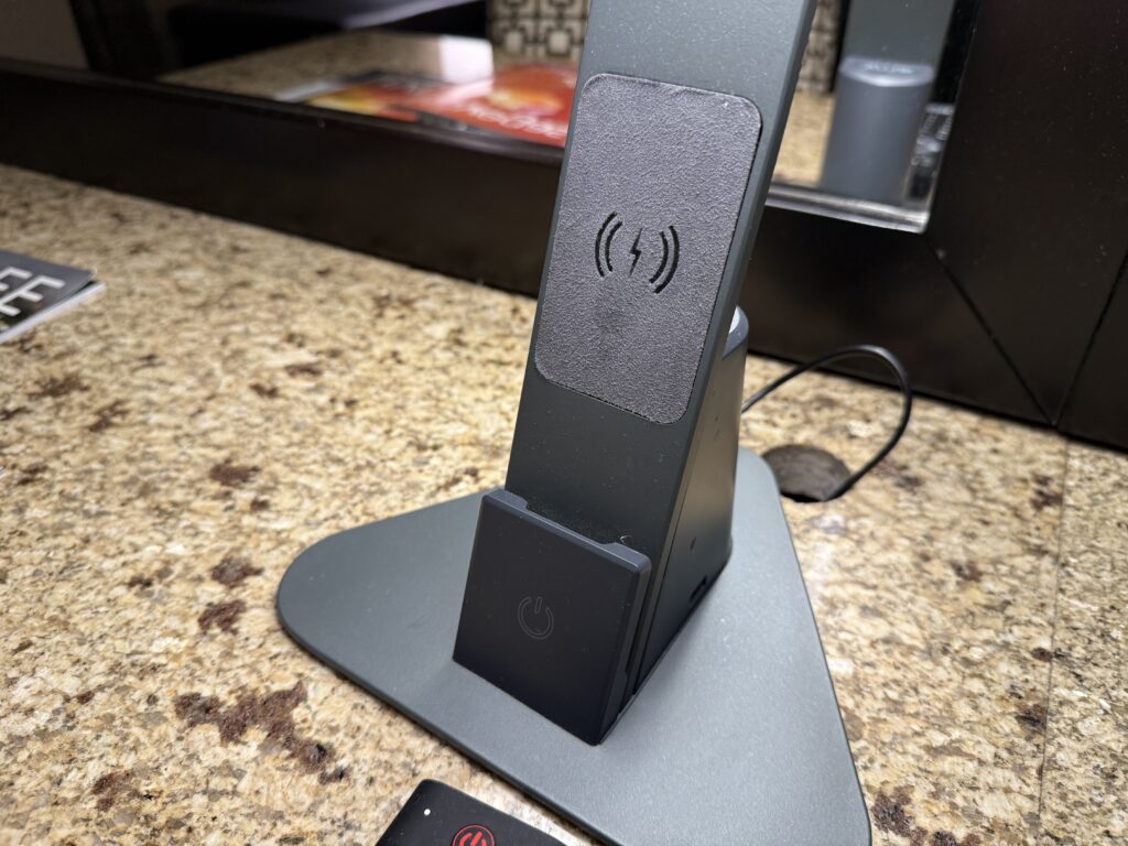 A close up of the wireless charging pad built into the lamp.