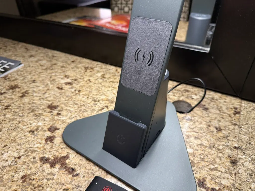 A close up of the wireless charging pad built into the lamp. 