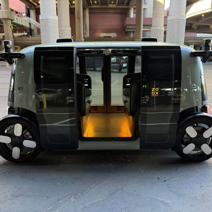 Side profile of my Zoox, with the doors open and ready for me to enter.