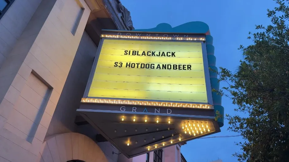 A sign advertising $1 Blackjack. 