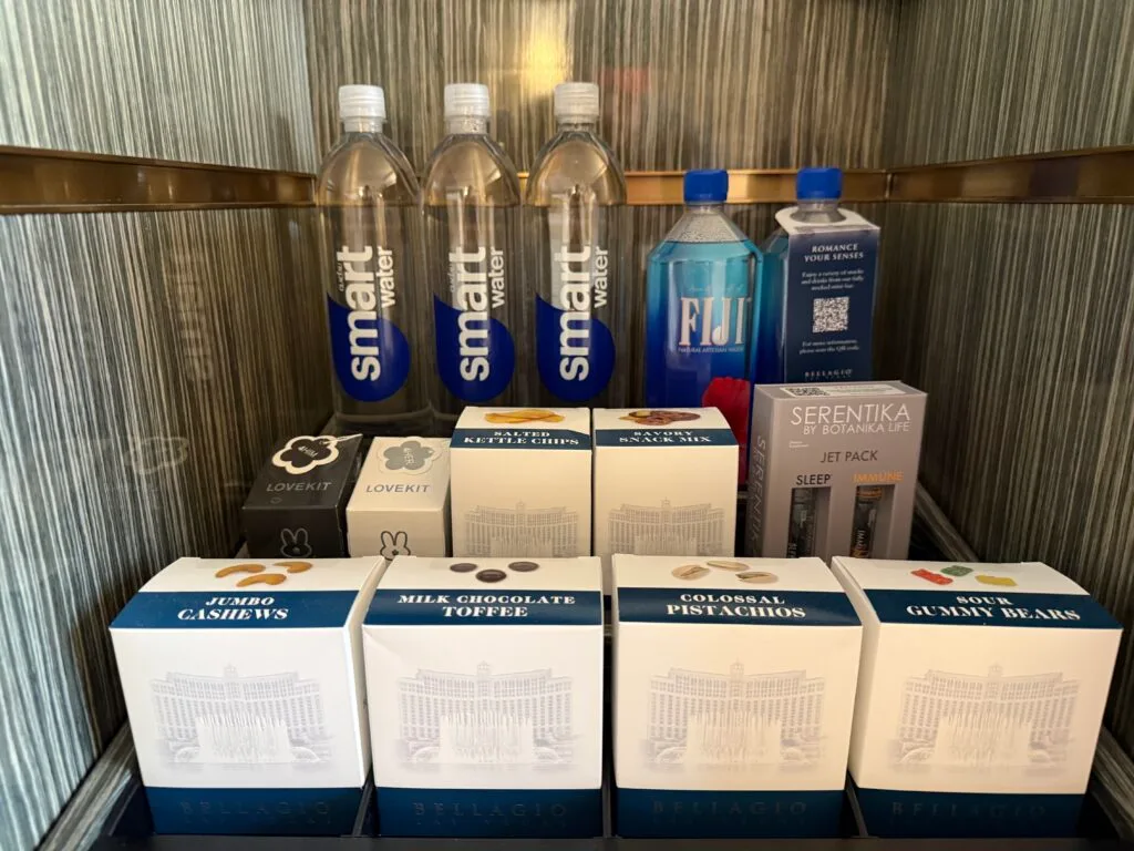 Dry mini bar with snacks and bottled water. 