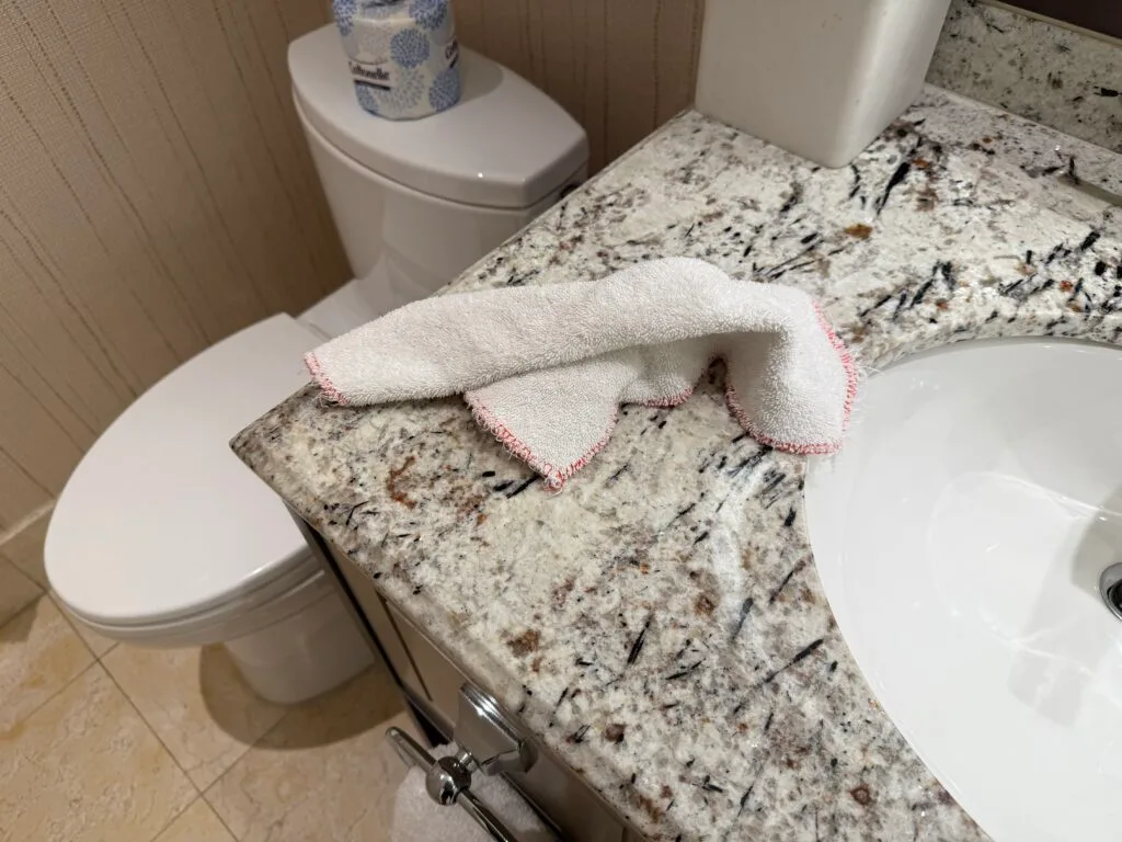A housekeeping rag, wadded up and left on the countertop. 