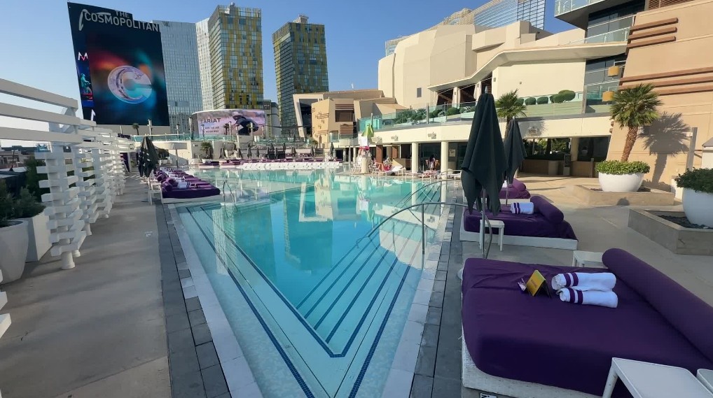 The boulevard pool with the resort's marquee and Veer towers in the background.