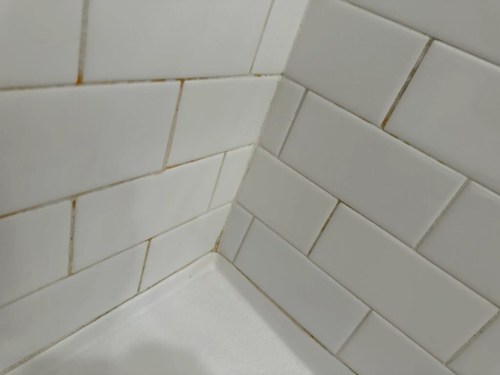 Grout lines that have yellowed. 