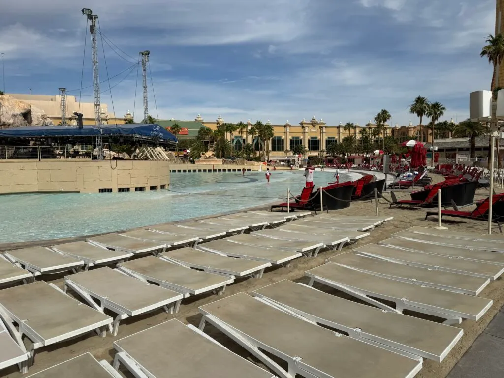 The wave pool, with loungers in the foreground.