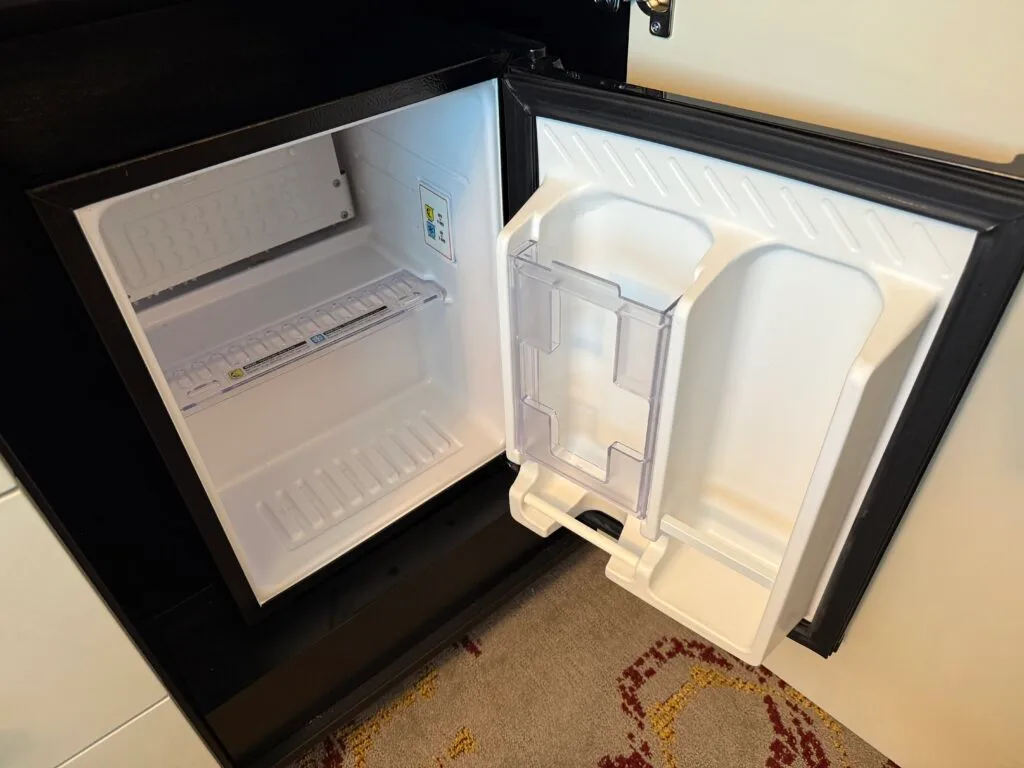 An empty mini fridge. 