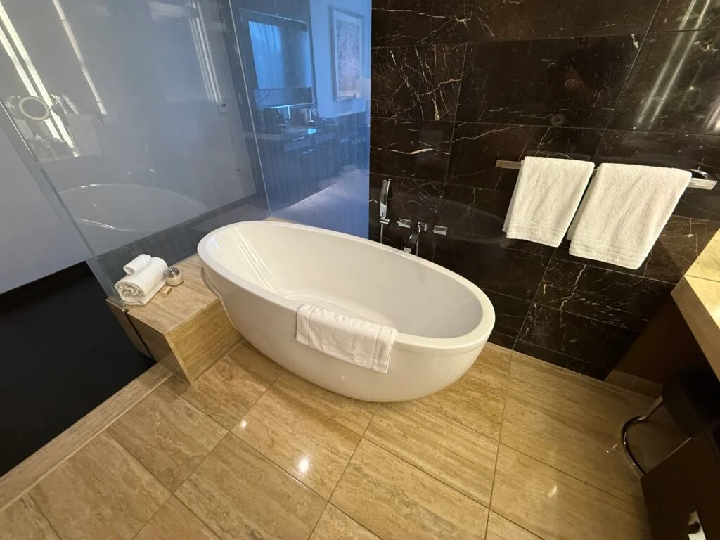 A window above the bath tub that allow anyone to peer in. 