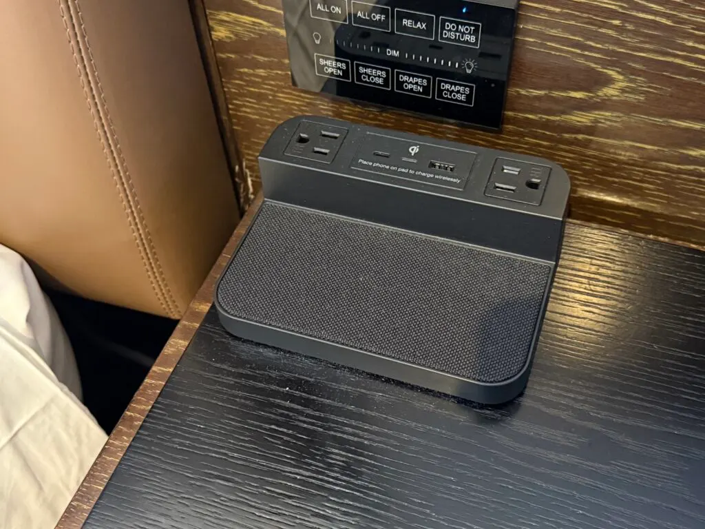 A bedside charge pad with built in outlets and USB ports. 