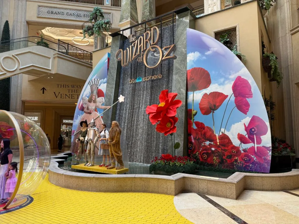 A photo op featuring the characters in Wizard of Oz, with a waterfall in the background.