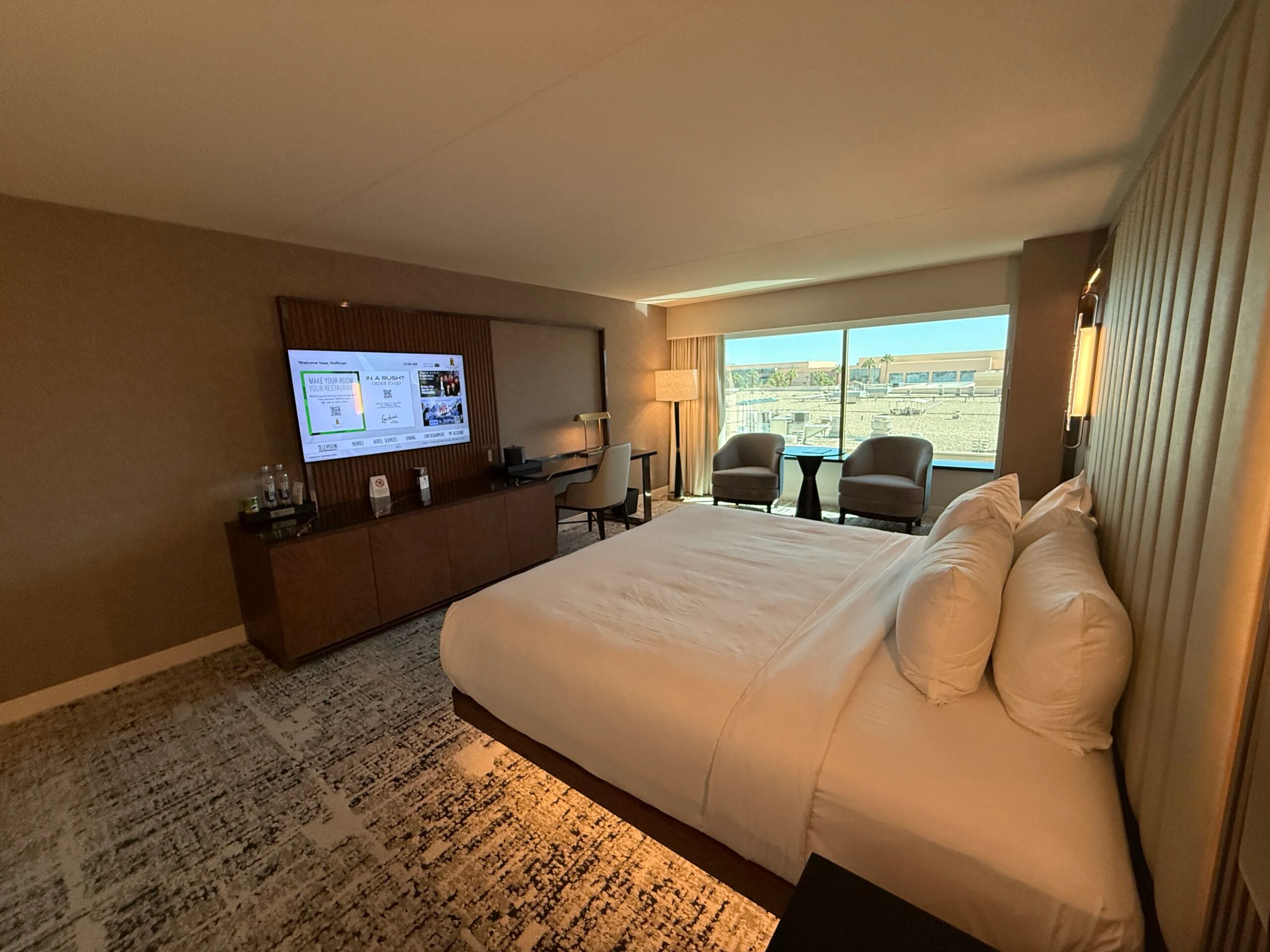 An angle of the room that shows the king bed pointed at the TV. 