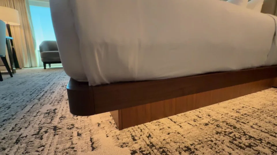 A close up of the corner of the bed, that really shows the illumination under the frame. 