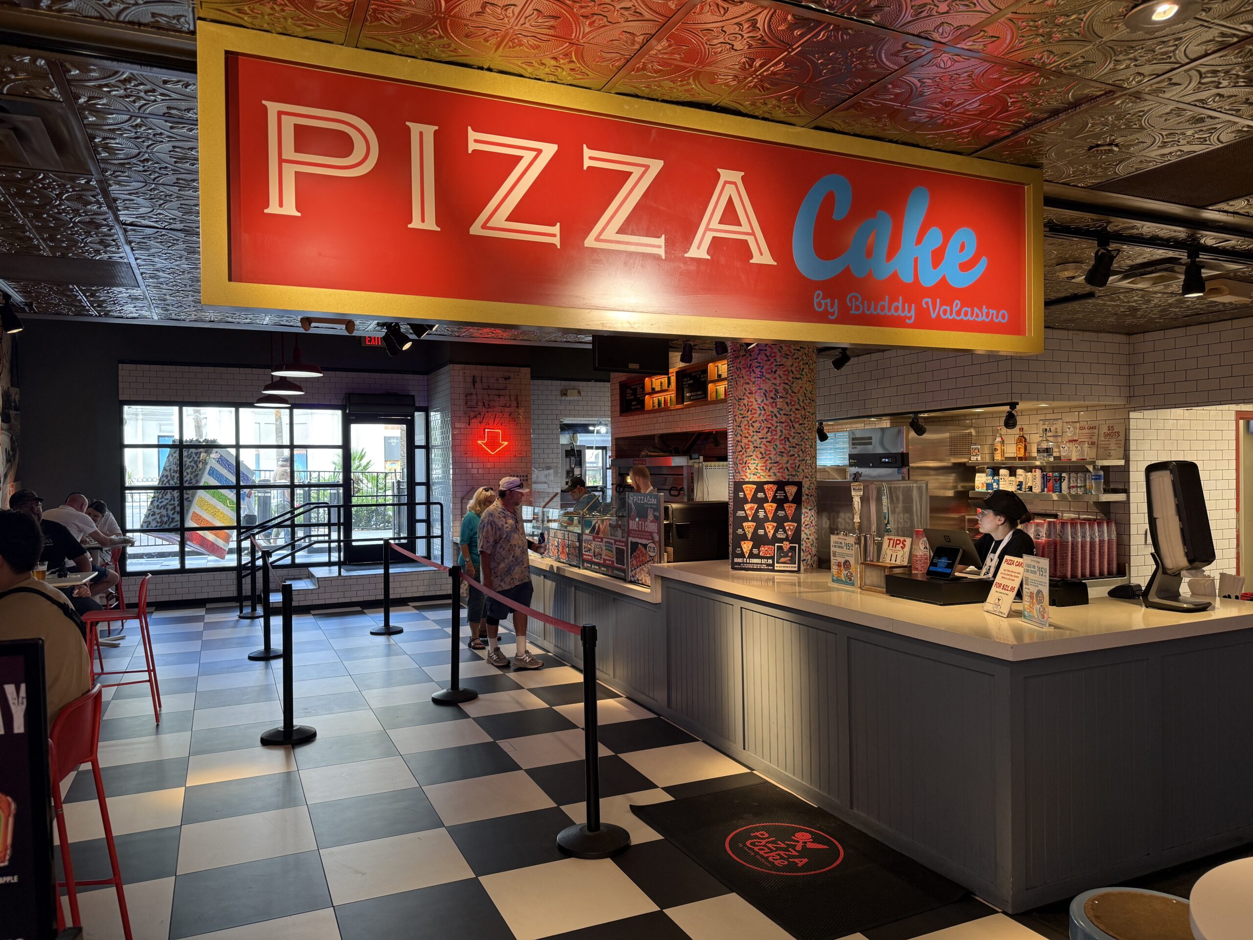 Entrance and signage for Pizza Cake within Harrah's.