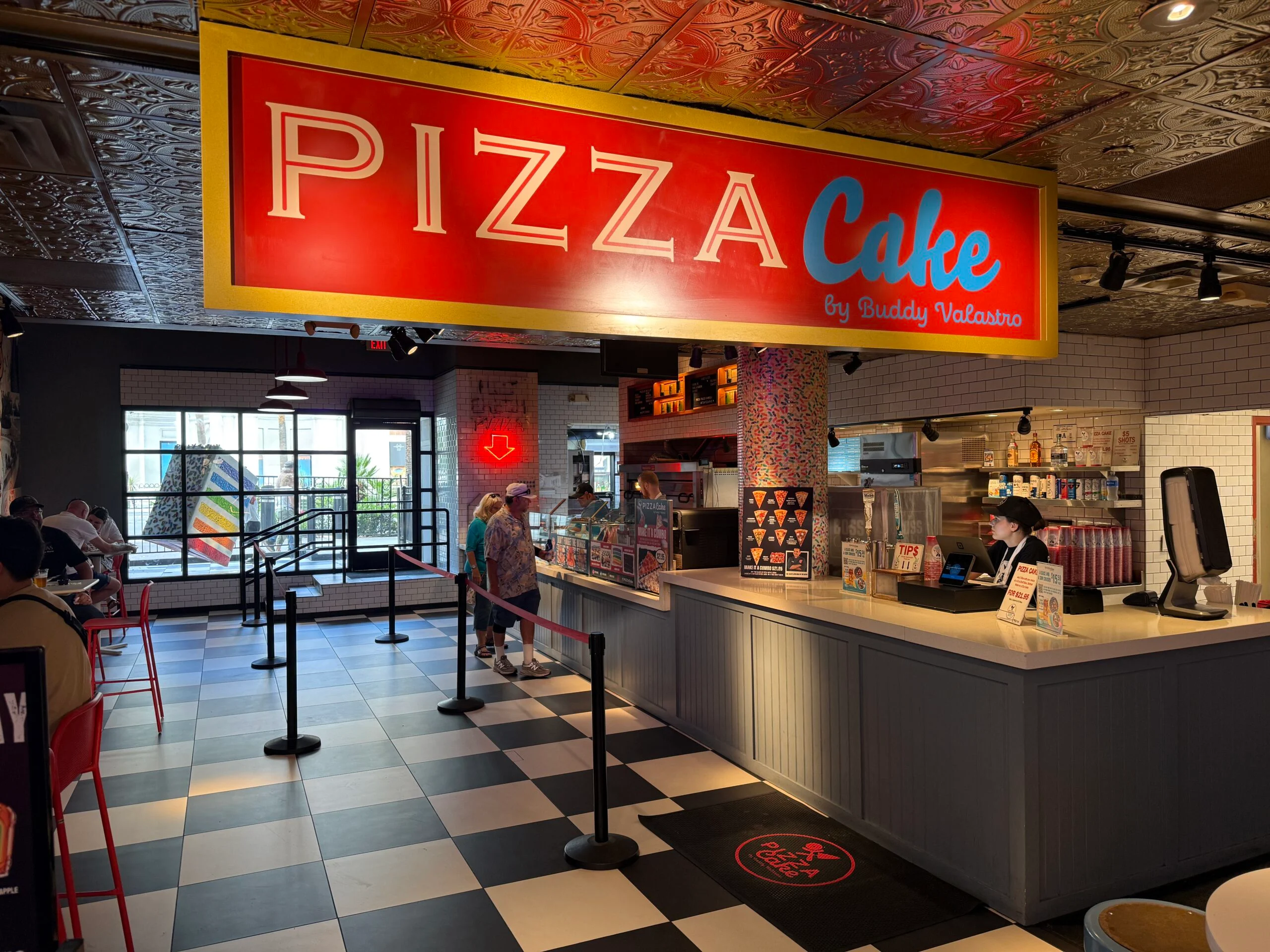 Entrance and signage for Pizza Cake within Harrah's. 