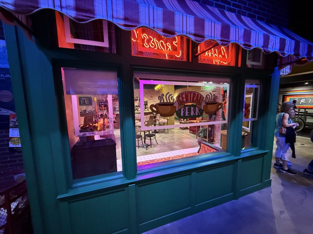 An exterior window of Central Perk with the logo emblazoned on it. 