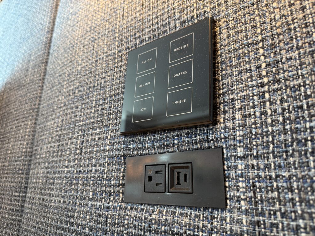 Bedside lighting and drape control panel. 