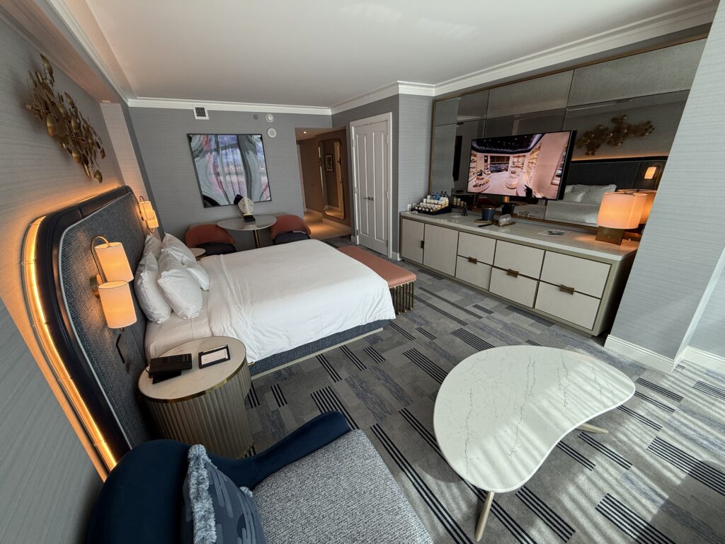 Another wide angle of the room showing the bed pointed at the TV. 