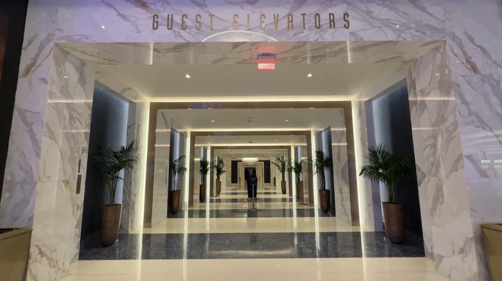 Guest elevator lobby on the main level, which has stone finishes.