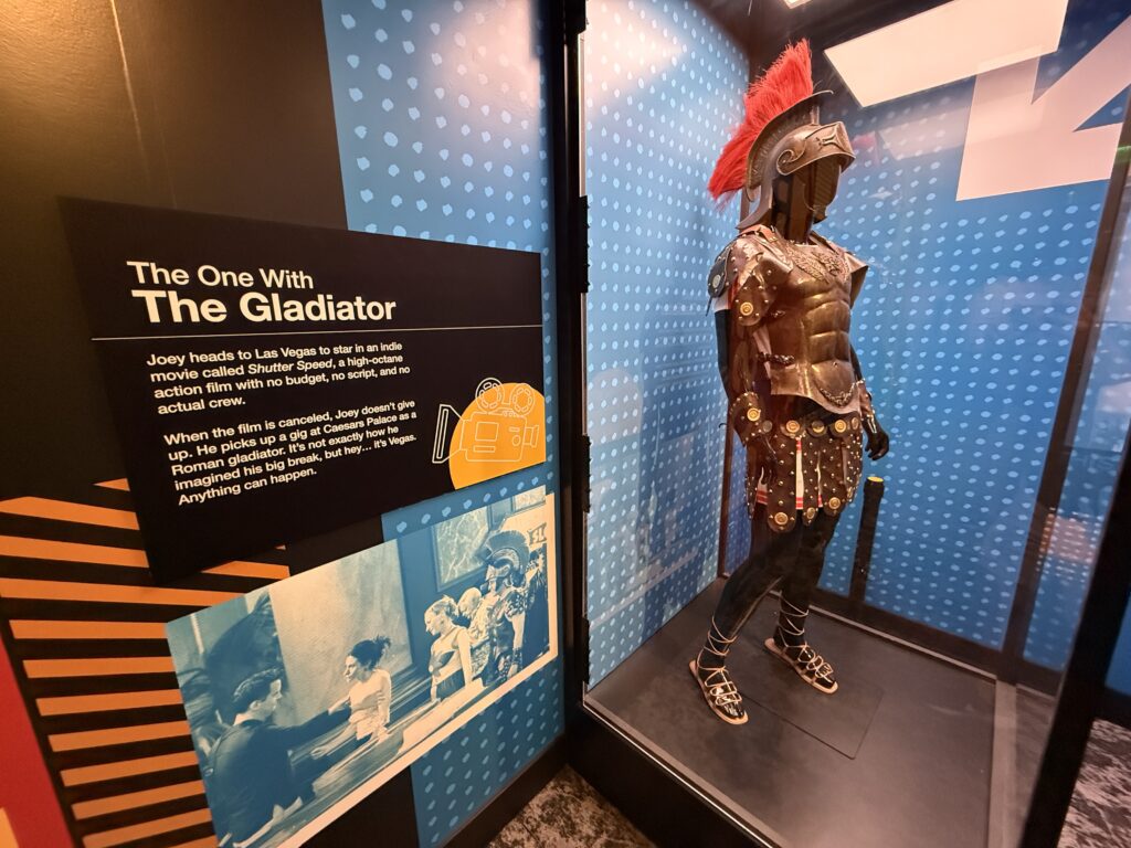 A gladiator costume behind glass. 