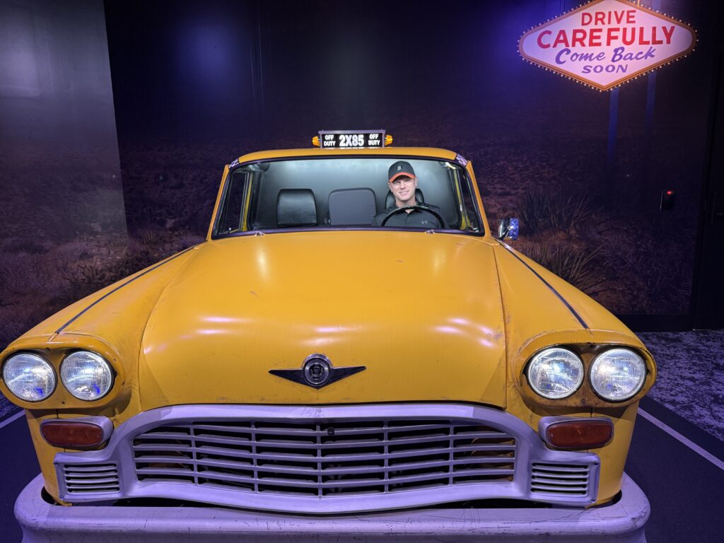 Me, sitting in the driver seat of a taxi cab. 