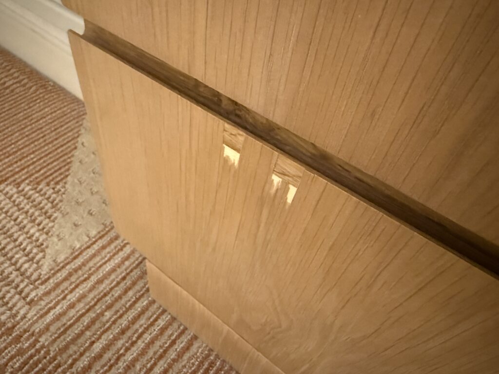 A dinged drawer front. 