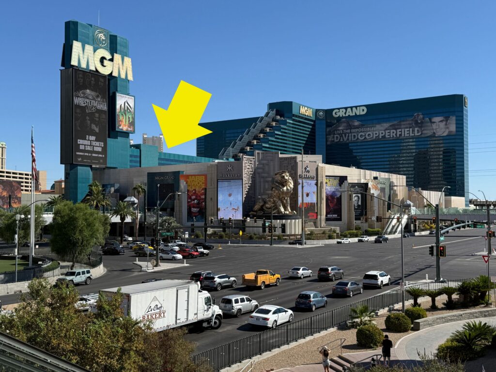MGM Grand's exterior with a yellow arrow pointing to the Studio Tower.