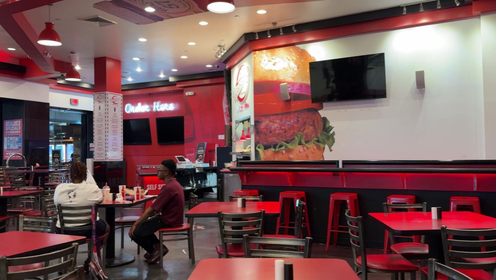 The deserted dining area at Ketchup with plenty of seating.