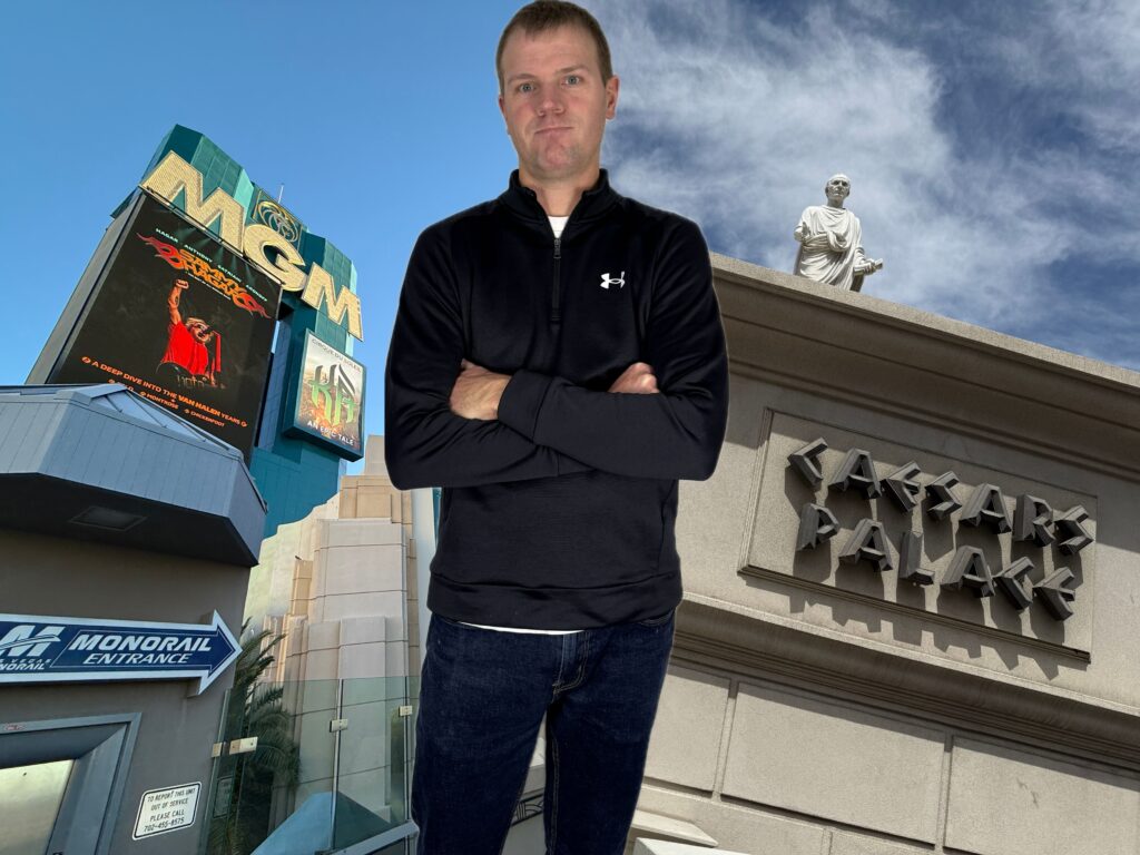 Me, standing in between images of MGM Grand and Caesars Palace.