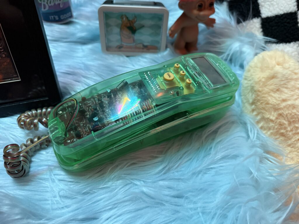 A close up of the see through phone. 
