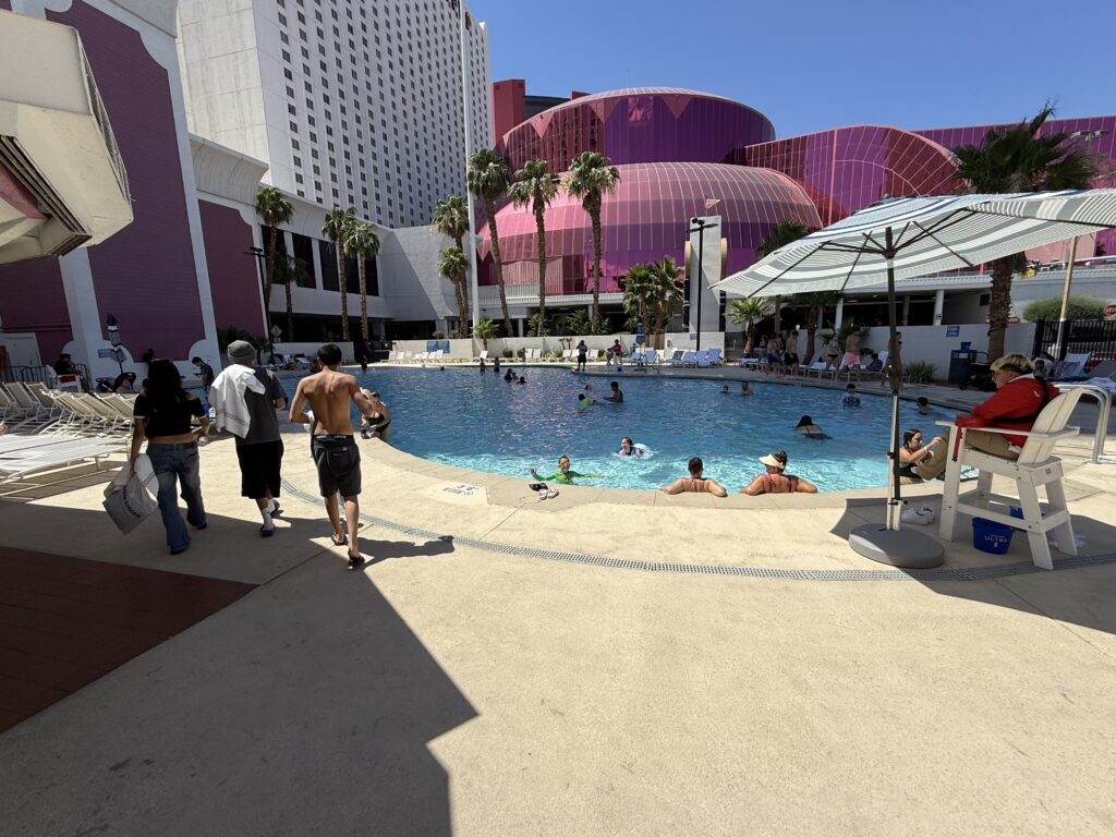 A standard resort pool with the Adventuredome in the distance.