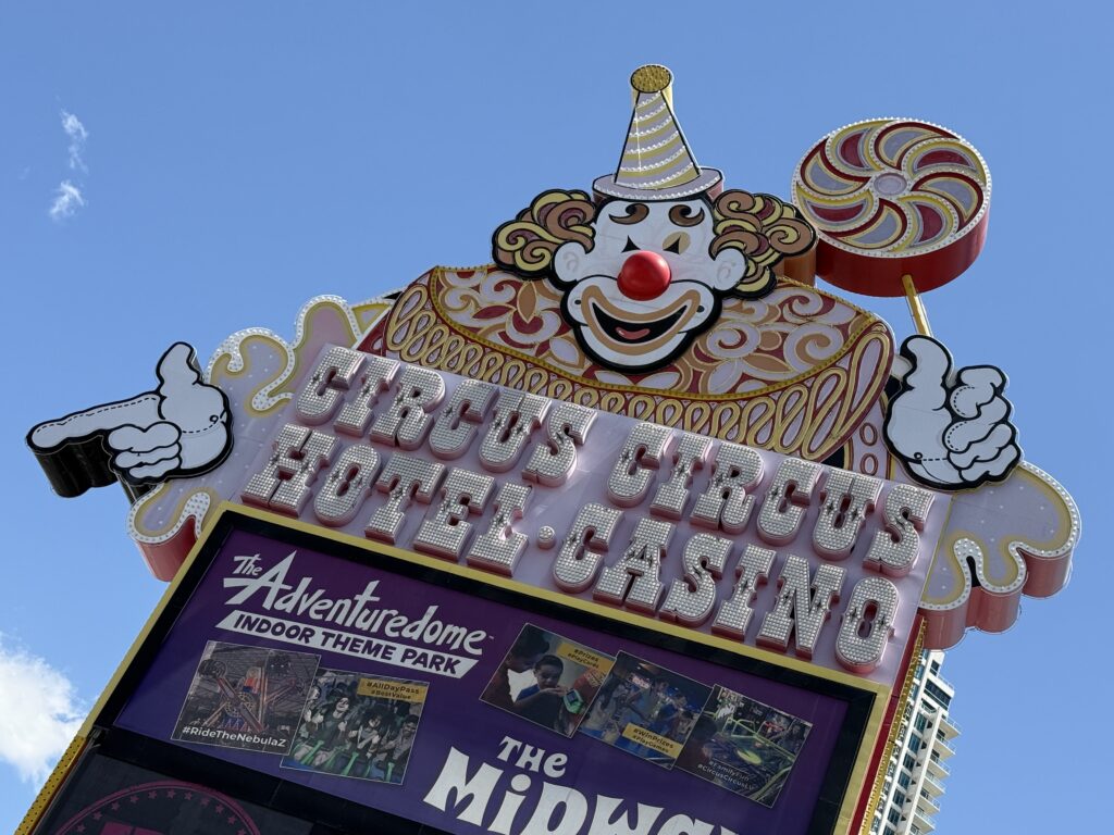 Circus Circus' neon sign during the day, which is modeled to look like a clown.